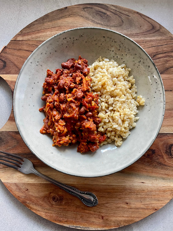 Chilli Con Carne hearty mild chilli con carne served on brown rice with feta cheese.